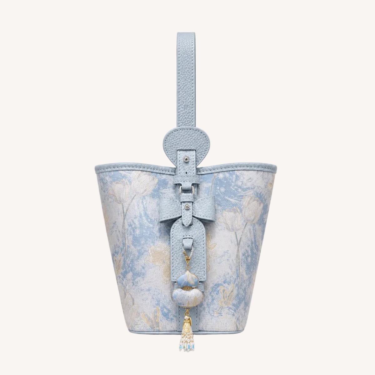 Song brocade bucket bag with heritage-inspired motif and structured elegant handbag silhouette