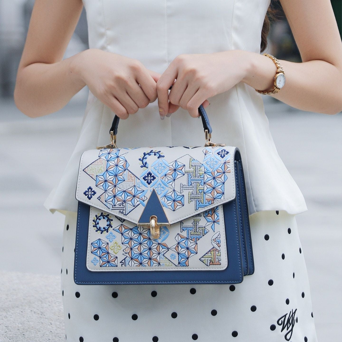 Chinese embroidered clutch bag styled for modern Chinese outfits and elegant daily carry lifestyle angle