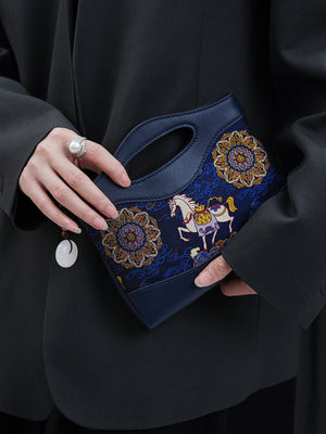 Mulberry silk clutch bag styled for modern Chinese outfits and elegant daily carry