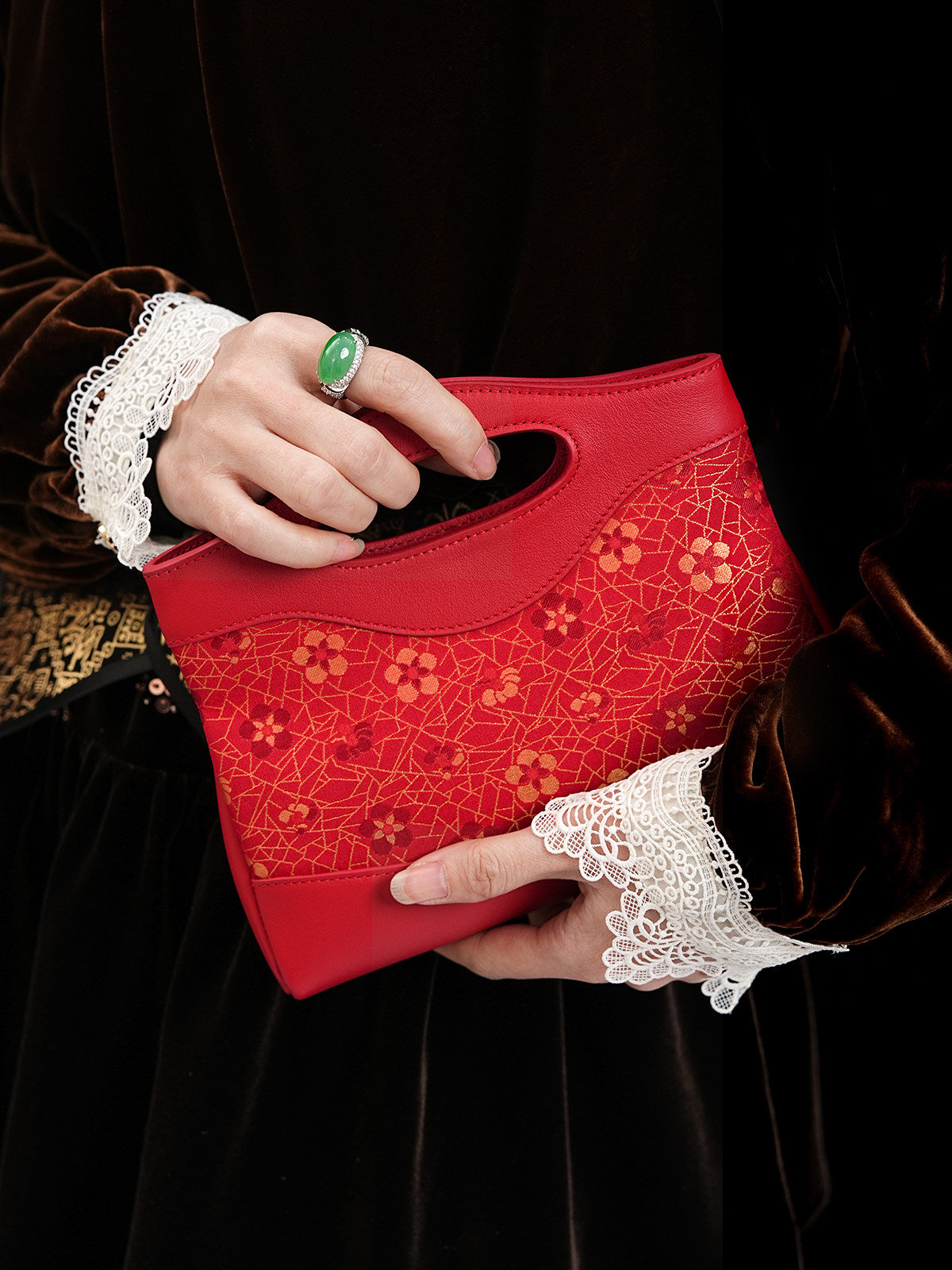 Close view of mulberry silk clutch bag showing woven motif texture and refined image 2