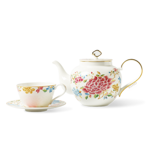 Three-piece floral bone china tea set with teapot and cup.
