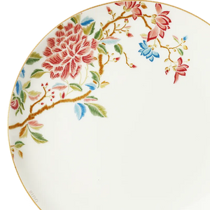 Close-up of floral rim pattern and fine craftsmanship on Chinoiserie bone china plate.
