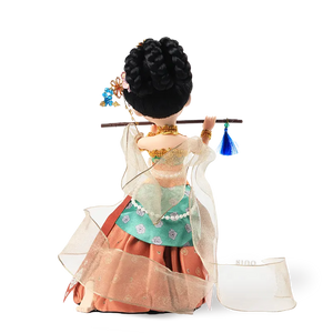 Back view of 9-inch handmade Dunhuang "Flute Song" doll with skirt details.