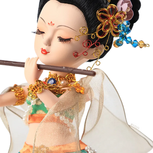 Left body and face detail of 9-inch Dunhuang "Flute Song" doll playing flute.