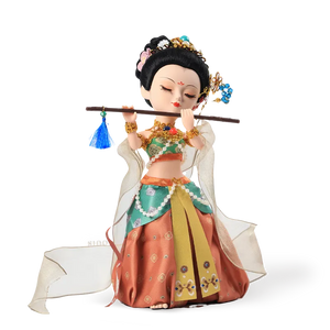 9-inch handmade Dunhuang Flying Apsara "Flute Song" doll main front view playing flute.