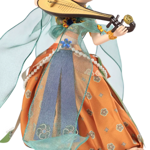 Body outfit detail of 9-inch Dunhuang "Pipa Dance" doll with green and orange layers.