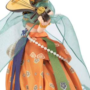 Left body outfit detail of 9-inch Dunhuang "Pipa Dance" doll with floral patterns.