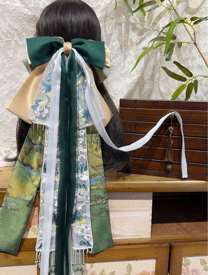 A Thousand Li of Rivers and Mountains oversized bow worn on hair with long ribbon tails