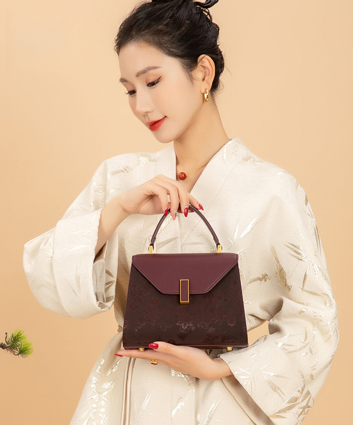 Xiangyunsha silk Kelly bag styled with modern Chinese outfit for elegant daily carry for Royal Purple Peony 2026 styling