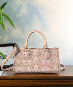 Pink Ding Sheng Song brocade mini tote with pale pink leather handles