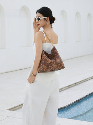 Persimmon Calyx Embroidered Hobo Bag | BrocadeModern