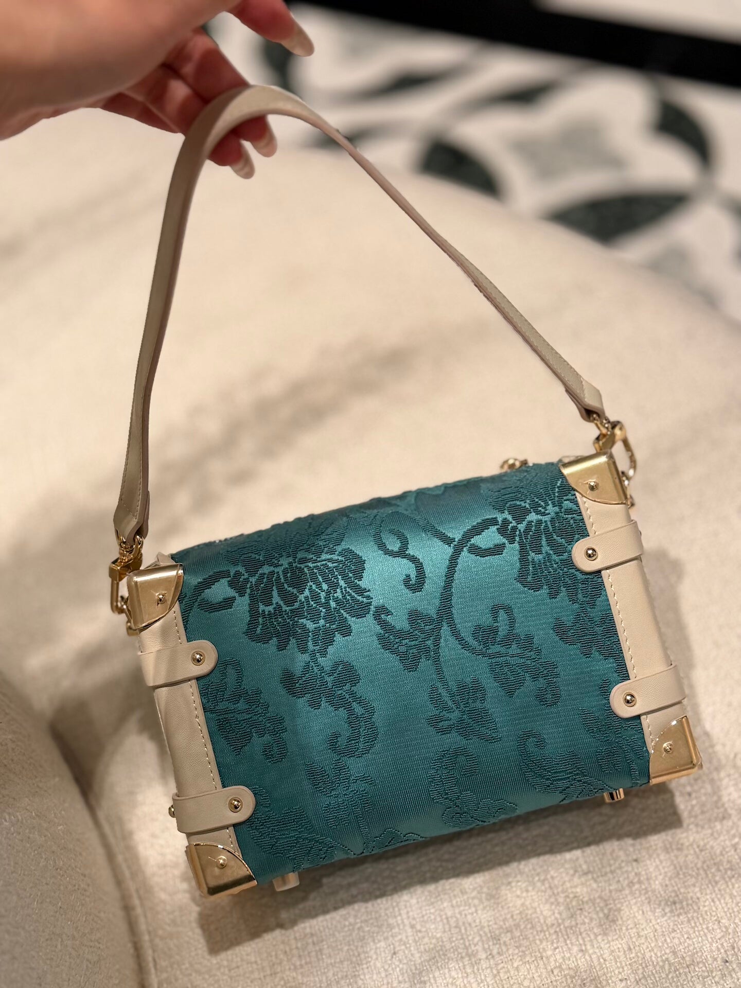 Gift-ready heritage textile clutch bag with heritage-inspired design for meaningful luxury gifting lifestyle angle