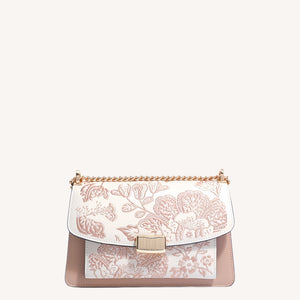 Close view of embroidered crossbody bag showing floral texture and refined leather finish featuring Chinese Style Begonia-brocademodern