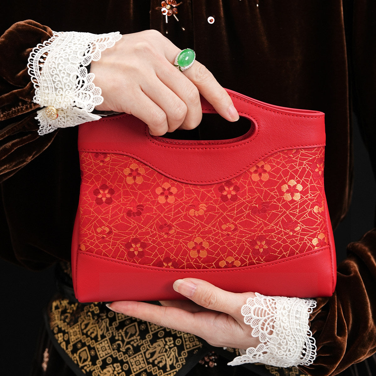 Mulberry silk clutch bag with floral motif and structured elegant handbag silhouette