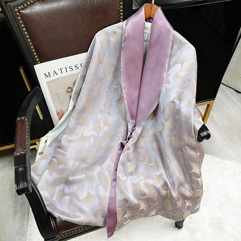 Close view of mulberry silk scarf showing smooth silk texture, color detail, and refined drape featuring Jacquard Mulberry