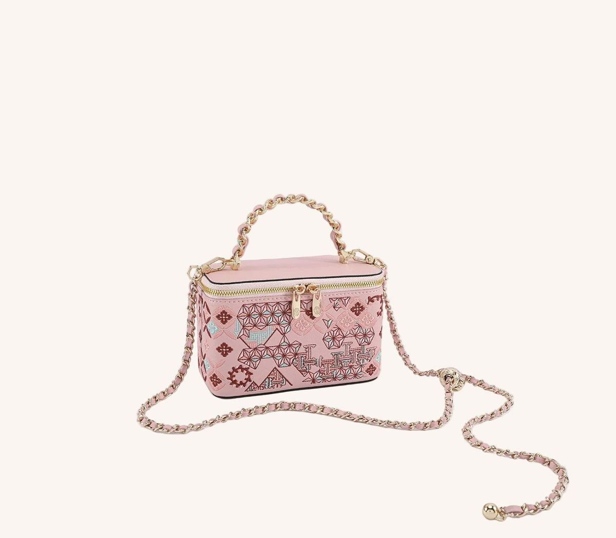 Gift-ready embroidered crossbody bag with heritage textile detail for meaningful luxury gifting