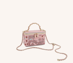 Gift-ready embroidered crossbody bag with heritage textile detail for meaningful luxury gifting