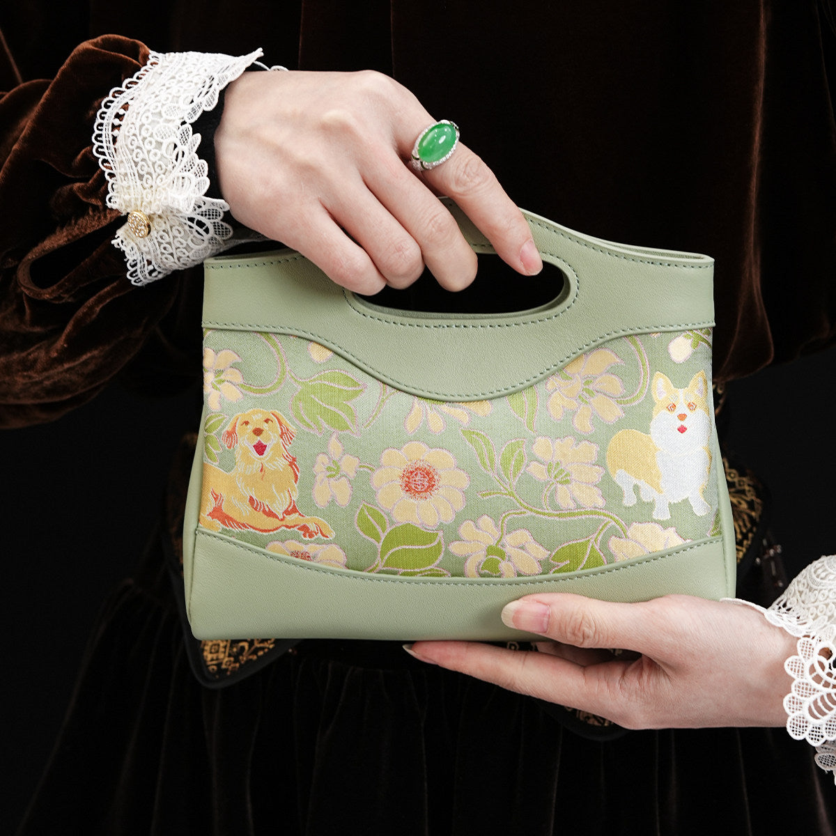 Mulberry silk clutch bag with heritage-inspired motif and structured elegant handbag silhouette