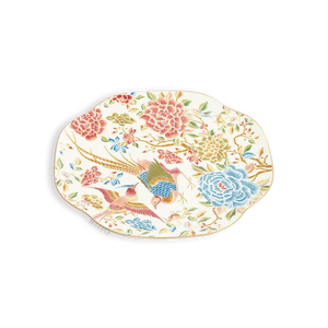 45° Angled view of floral and bird square dinner plate.