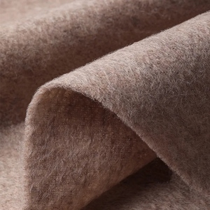 Precision-crafted edge on Chinese rose cashmere scarf.
