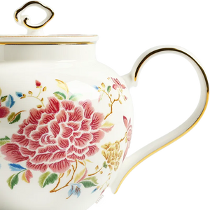 Detail of 420ml chinoiserie teapot half body with floral embroidery and button handle.