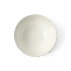 Top view of single Chinoiserie bone china round bowl showing interior texture and floral design.