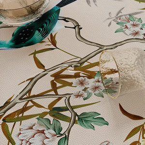 Wiping spill from leather table mat, easy clean.
