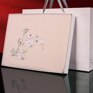 Elegant gift box packaging for plum blossom cashmere scarf, premium presentation.