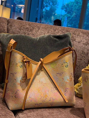 Tote bag detail with refined hardware, secure closure, and heritage textile craftsmanship featuring Large Tote Shoulder Bag