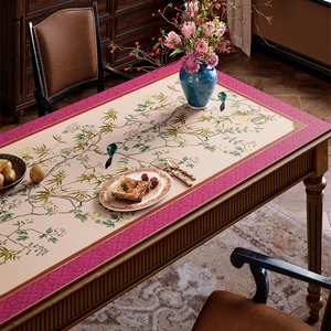 Right detail of pink floral bird table mat with dining set.