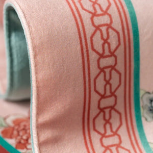 Soft plush texture of vintage blossom tablecloth.