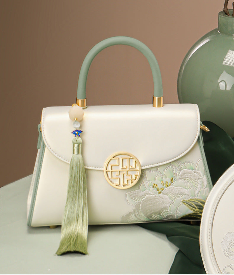 Chinese brocade and embroidered handbags displayed in elegant modern styling