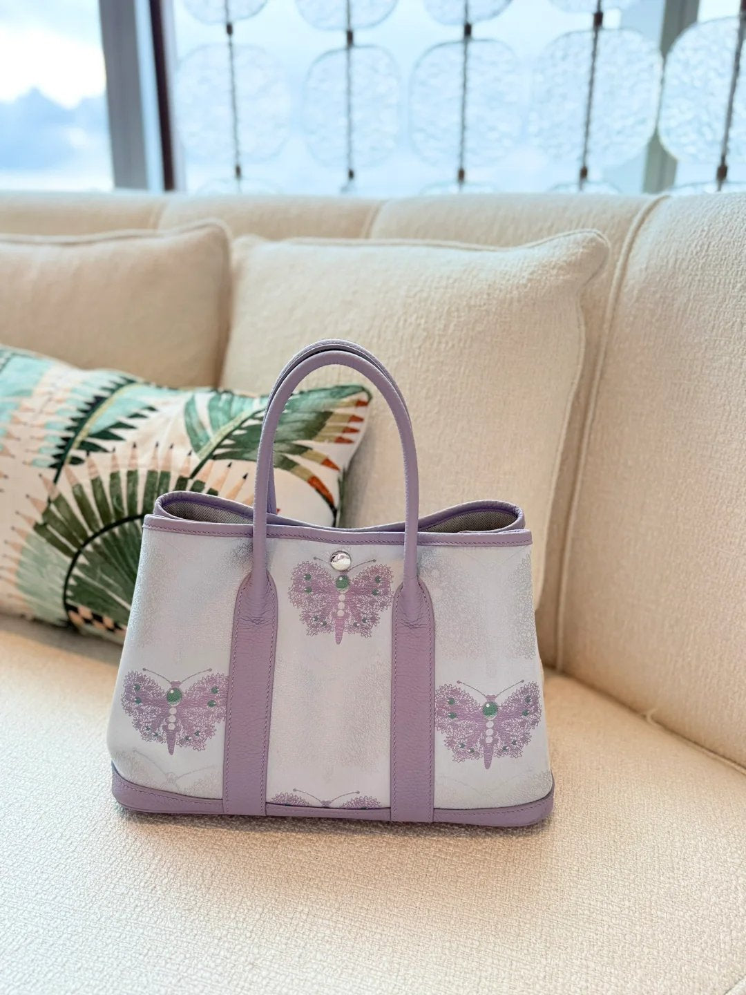 Close view of mulberry silk clutch bag showing woven motif texture and refined image row 529
