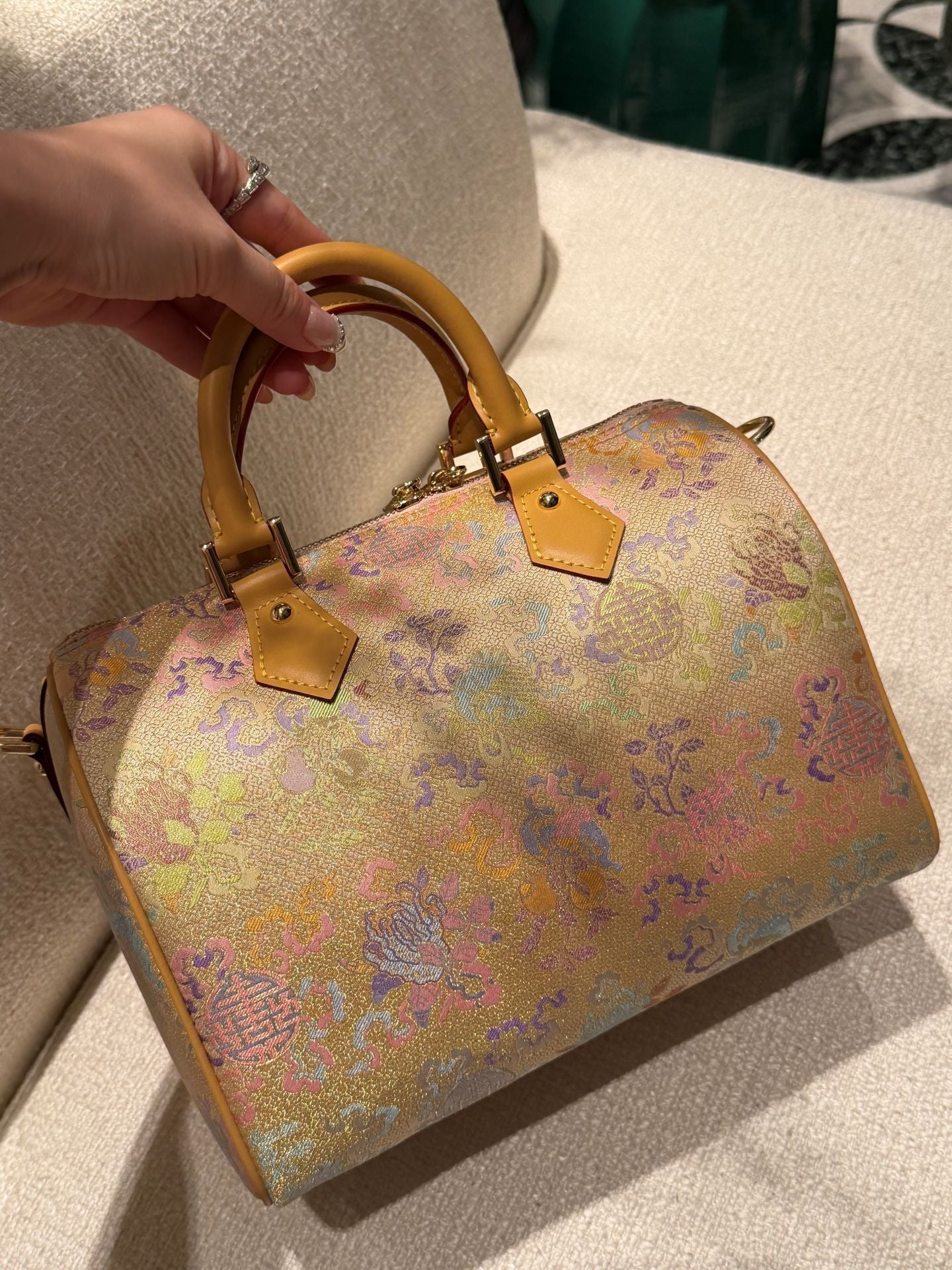 Boston bag detail with refined hardware, secure closure, and heritage textile craftsmanship detail angle