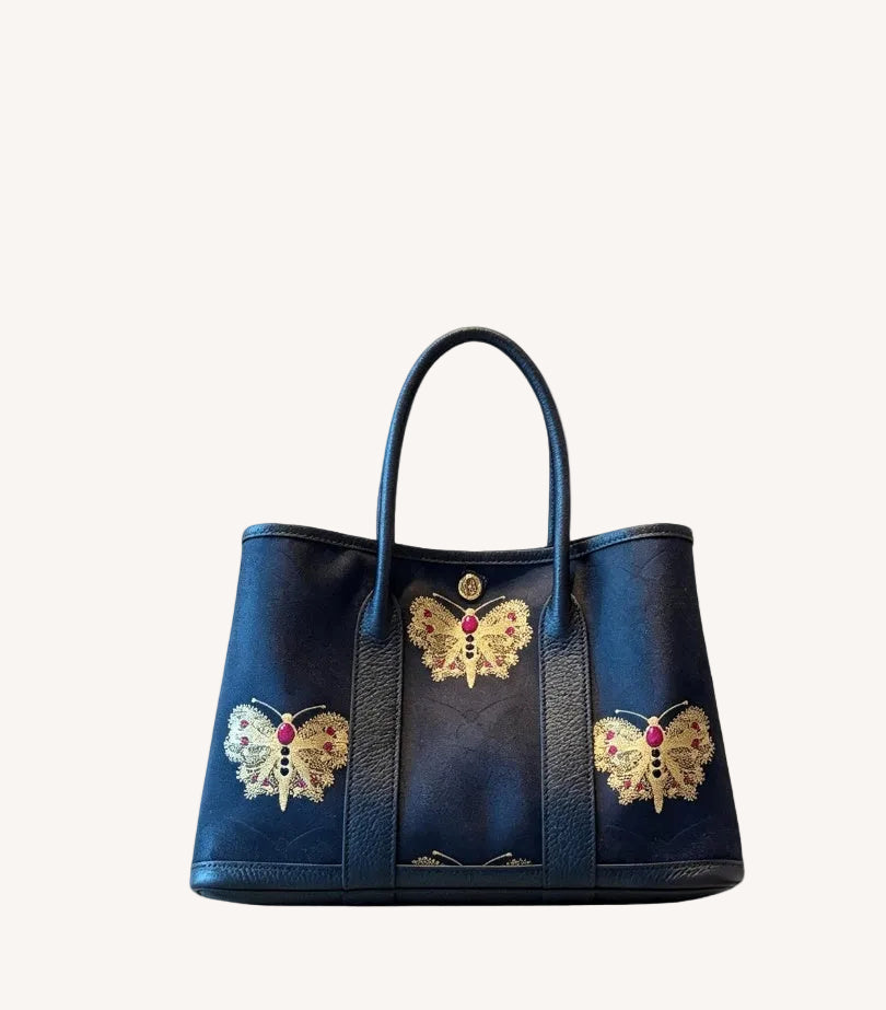 Mulberry silk clutch bag with butterfly motif and structured elegant handbag silhouette featuring Song Brocade Garden Tote