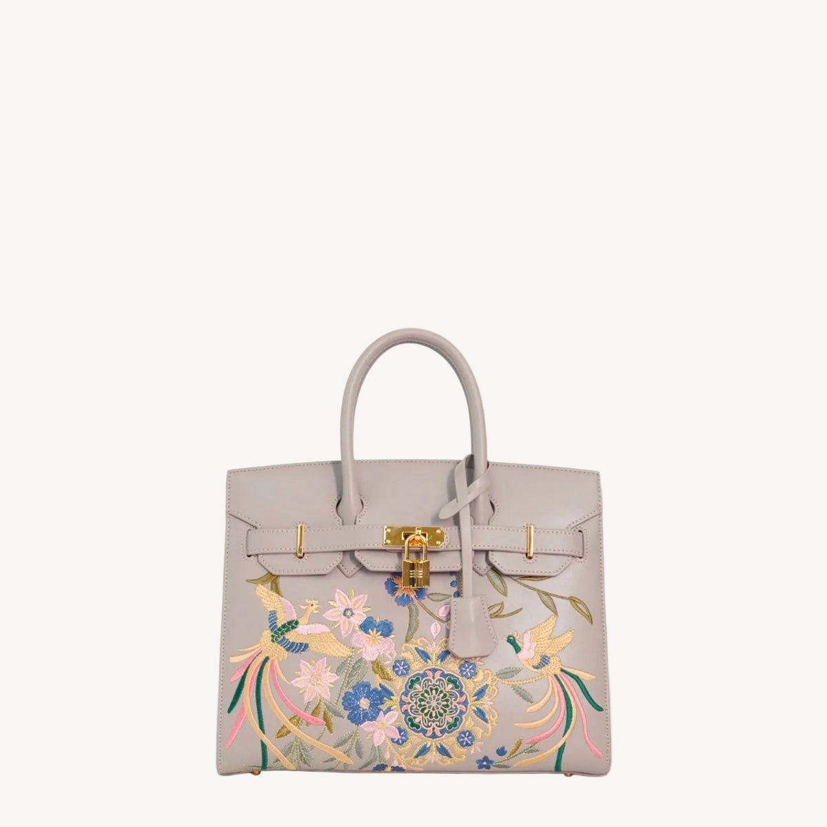 Chinese embroidered crossbody bag with phoenix and pear blossom motif and structured heritage handbag silhouette-brocademodern