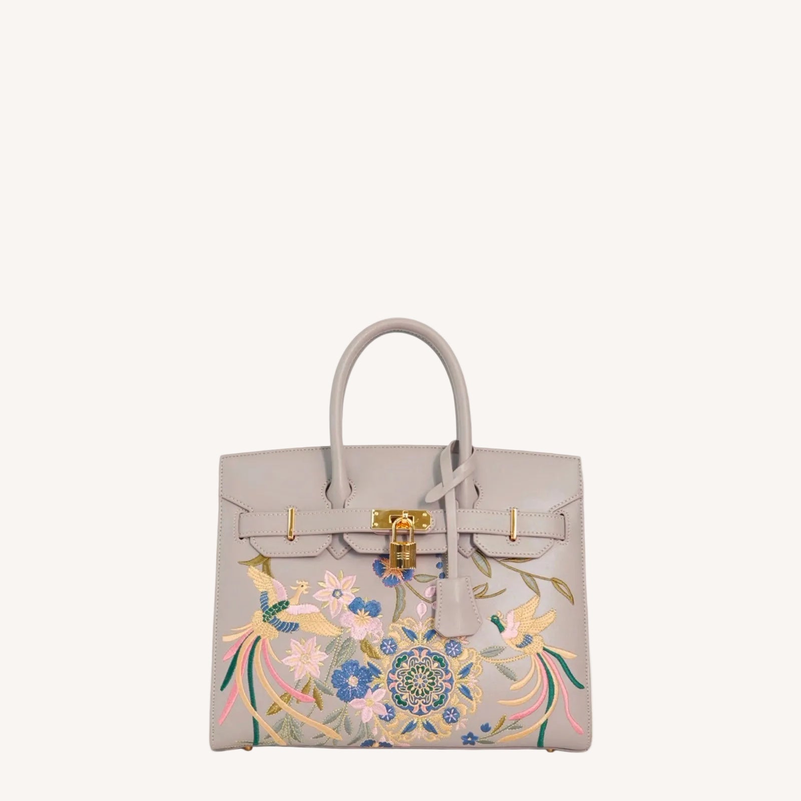 Chinese embroidered crossbody bag with phoenix and pear blossom motif and structured heritage handbag silhouette-brocademodern