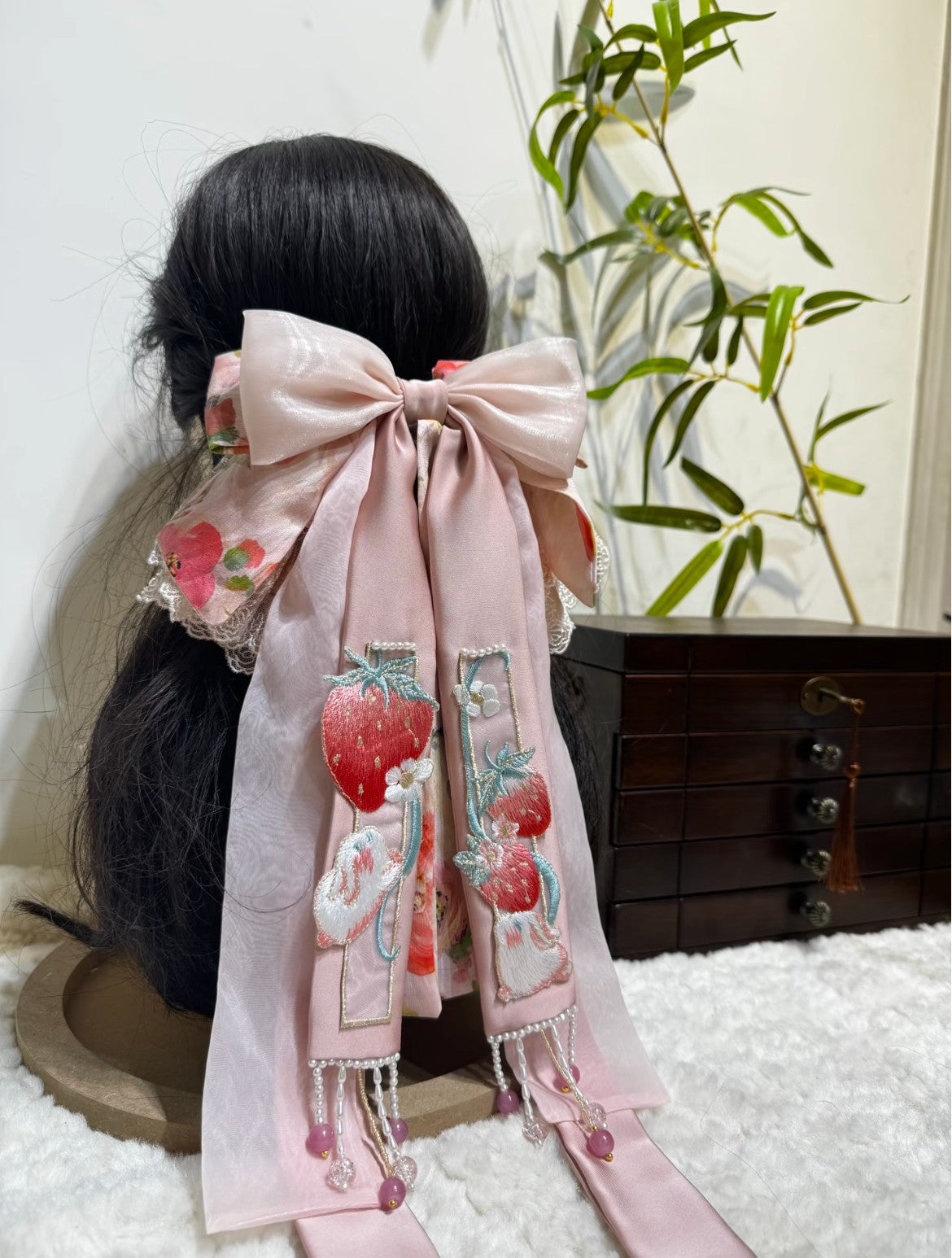 Sweet Rabbit in Bloom new Chinese hair clip shown from side with plush bow volume