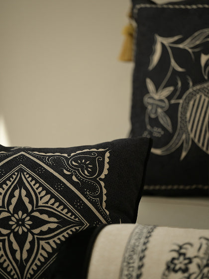 Close view of decorative cushion showing heritage textile texture and refined woven pattern featuring Arabesque Motif