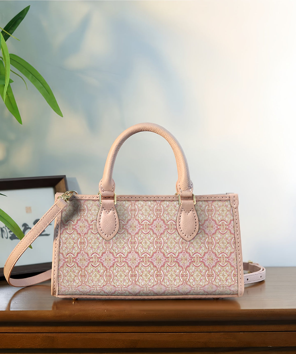 Pink Ding Sheng Song brocade mini tote with pale pink leather handles