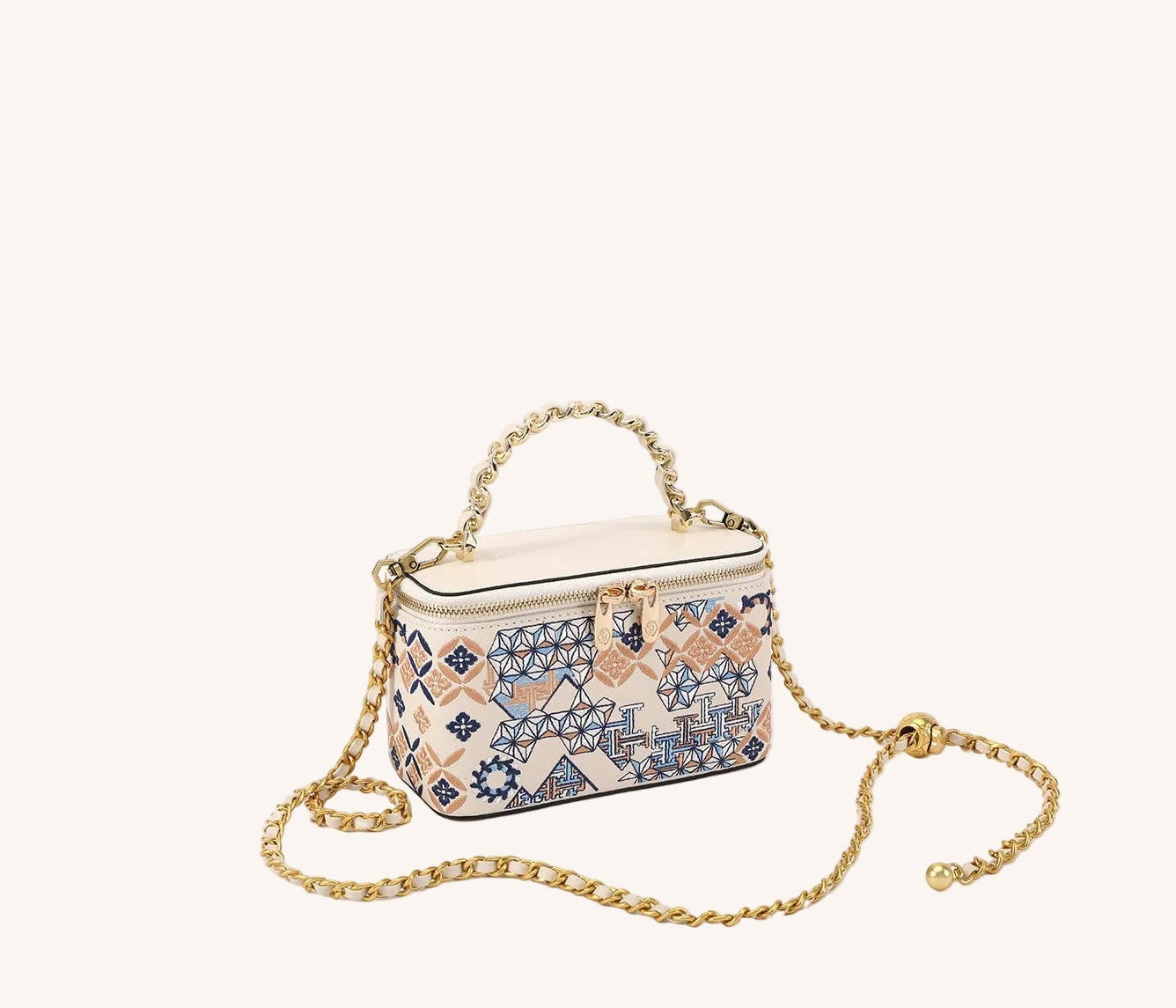 Gift-ready embroidered crossbody bag with heritage textile detail for meaningful luxury gifting featuring Museum