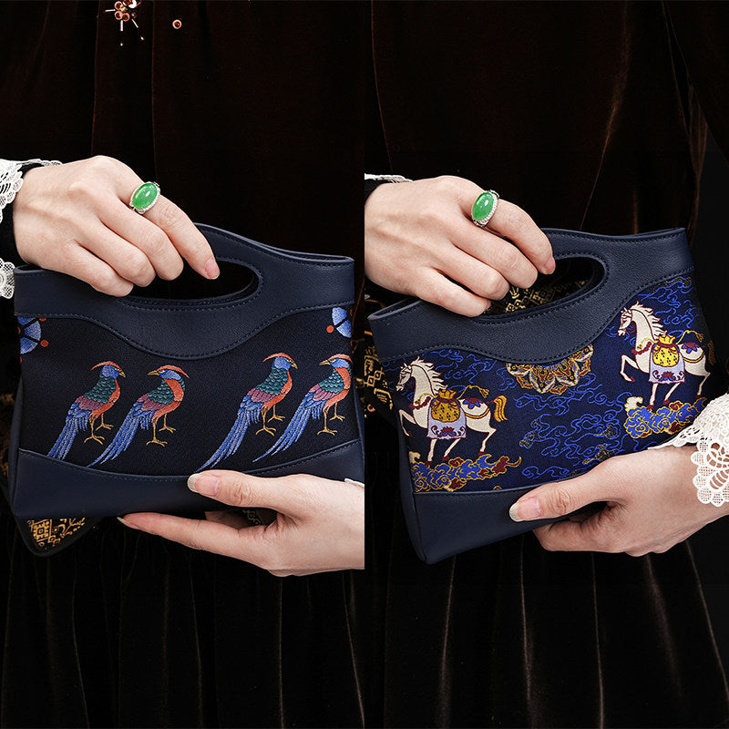 Mulberry silk clutch bag with lucky horse motif and structured elegant handbag silhouette