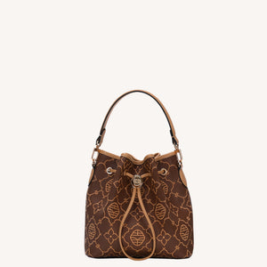 Close view of embroidered bucket bag showing floral texture and refined leather finish-brocademodern