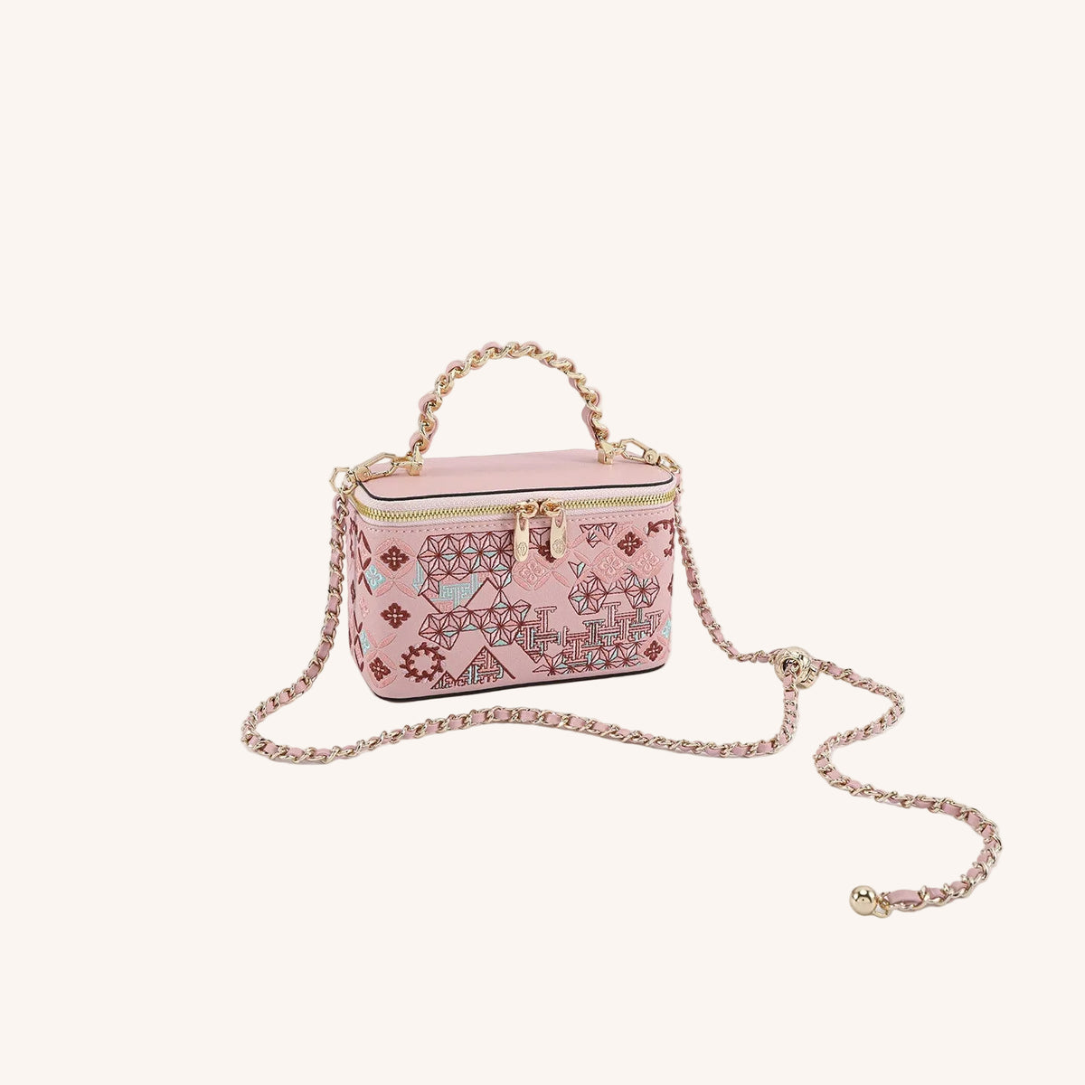 Gift-ready embroidered crossbody bag with heritage textile detail for meaningful luxury gifting