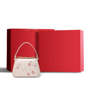 Red gift box packaging for plum blossom handbag.
