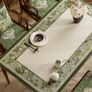 Left detail of chinoiserie table mat with dining set.