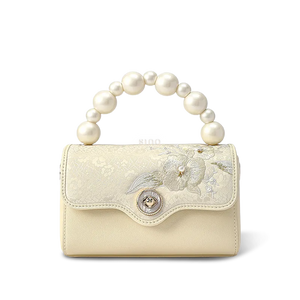 Front view: Orchid butterfly embroidered silk handbag.