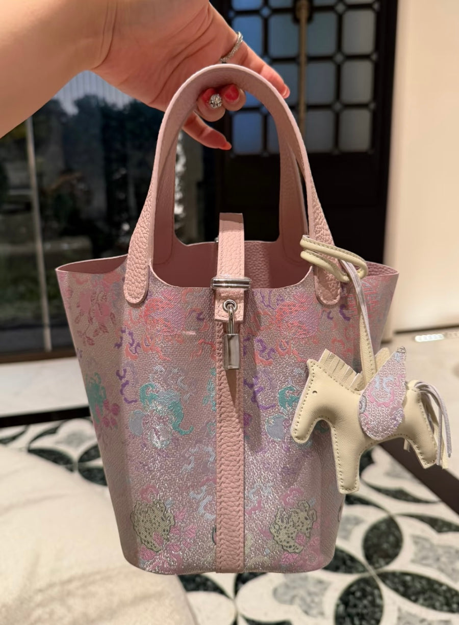 Pink Ancient Coins Three Blessings Chinese Song Brocade handbag with soft pink tones, auspicious coin motifs, and a horse charm accent brocademodern