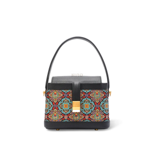Front view: Song brocade scrolling foliage lotus crossbody bag.