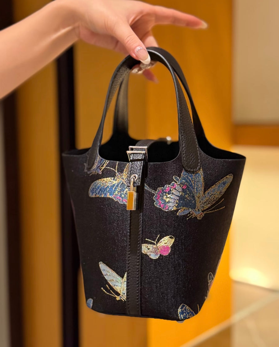 Spring Rain Butterflies Chinese Song Brocade handbag in black with butterfly motifs, black leather handles, and a refined structured silhouette brocademodern